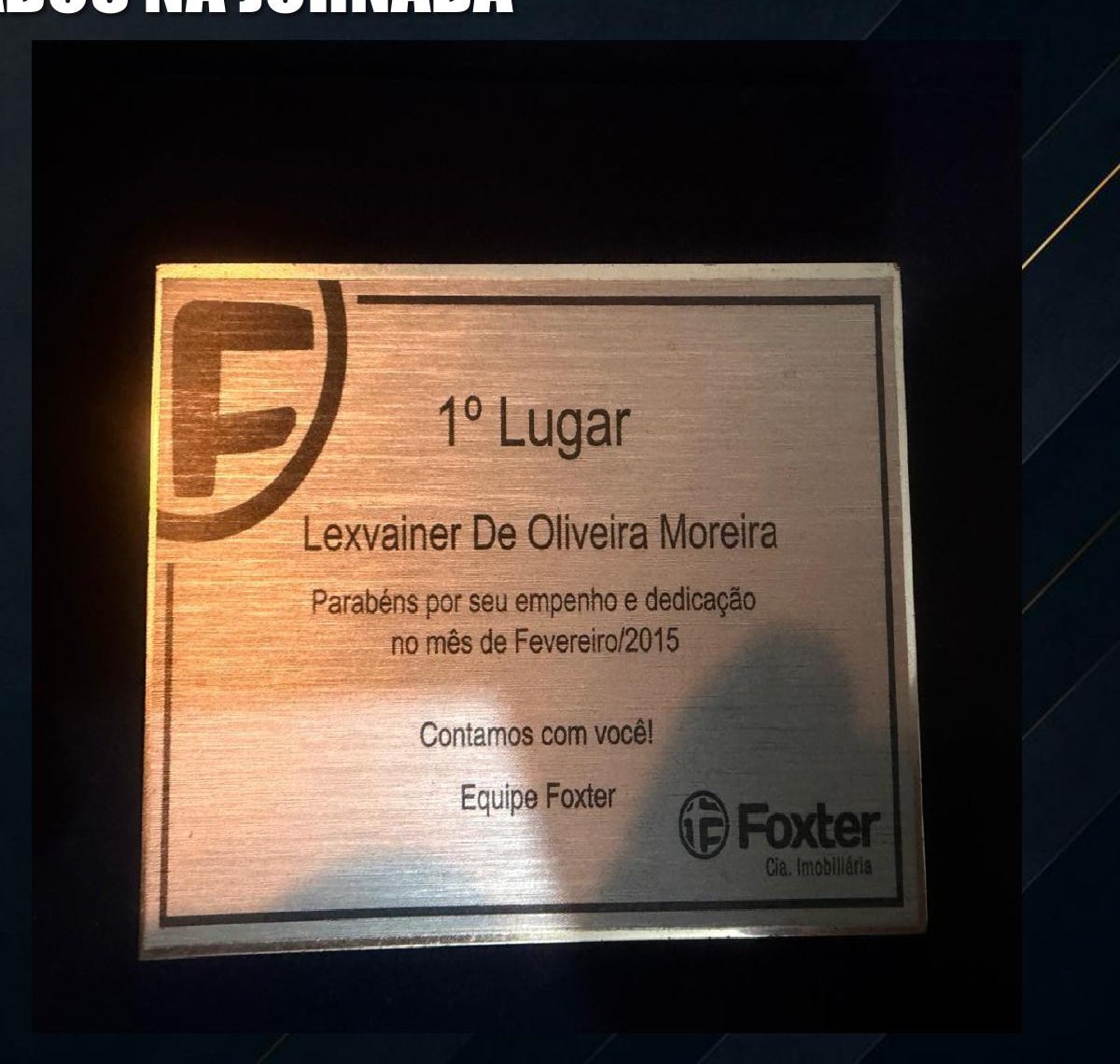 Placa de premiação de 1º lugar entregue a Lexvainer De Oliveira Moreira pela equipe Foxter em fevereiro de 2015
